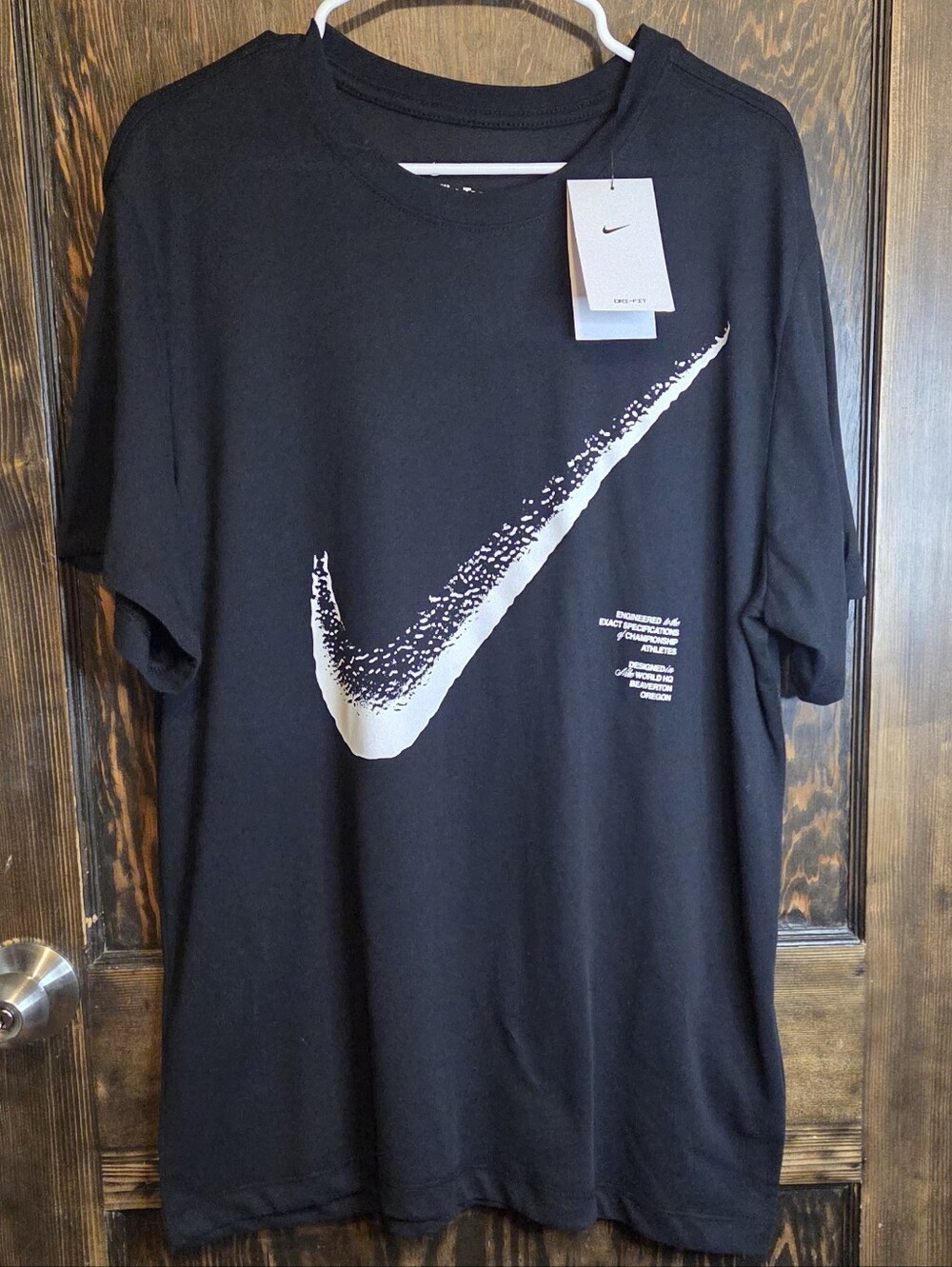NWT Nike Men's Dri-Fit White Swoosh Graphic T‑Shirt in Black